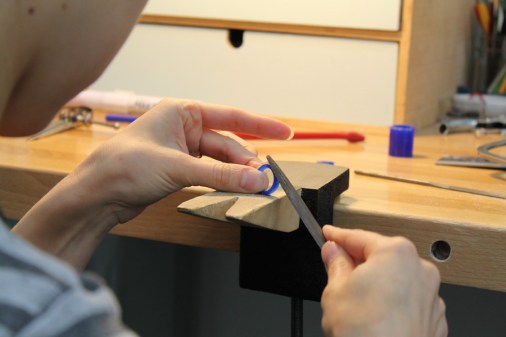 Reducing ring size by filing down exterior