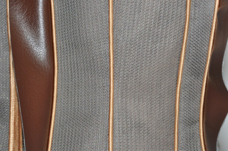 A close look at the materials assembled for Leliana's coat of armor.