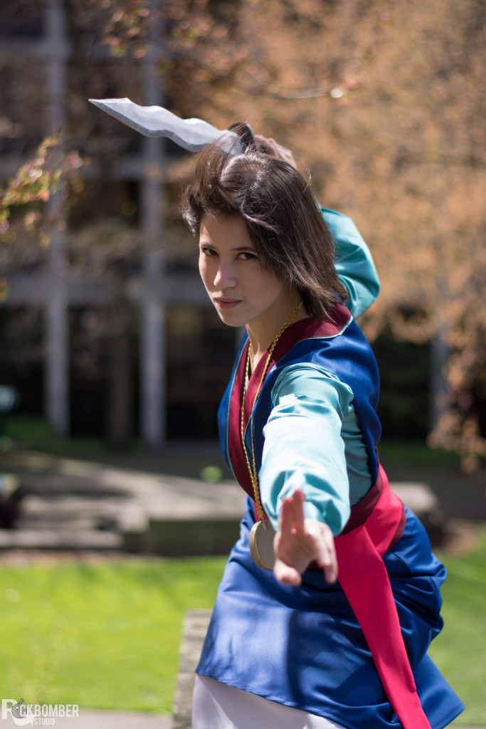 Mulan attacks with Shan Yu's sword